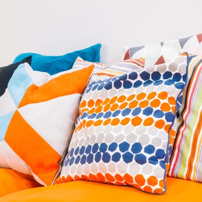 Patio outdoor deck with colorful pillow on chair decoration exterior of home - Vintage light filter